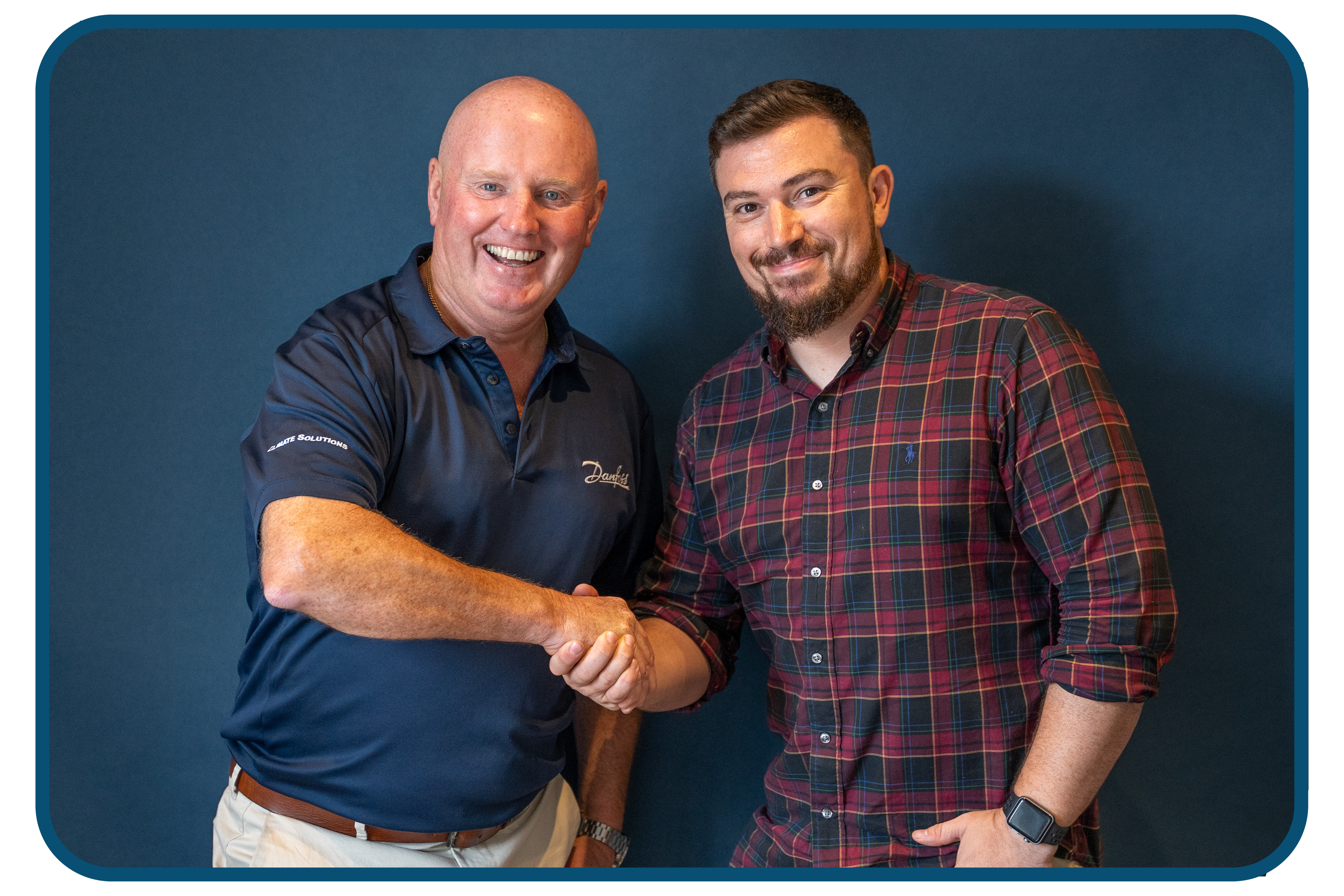 	Ian Hill, Key Account Manager Danfoss shakes  Richard Holland  National Sales Manager  Contour Heating Products Ltd hand 